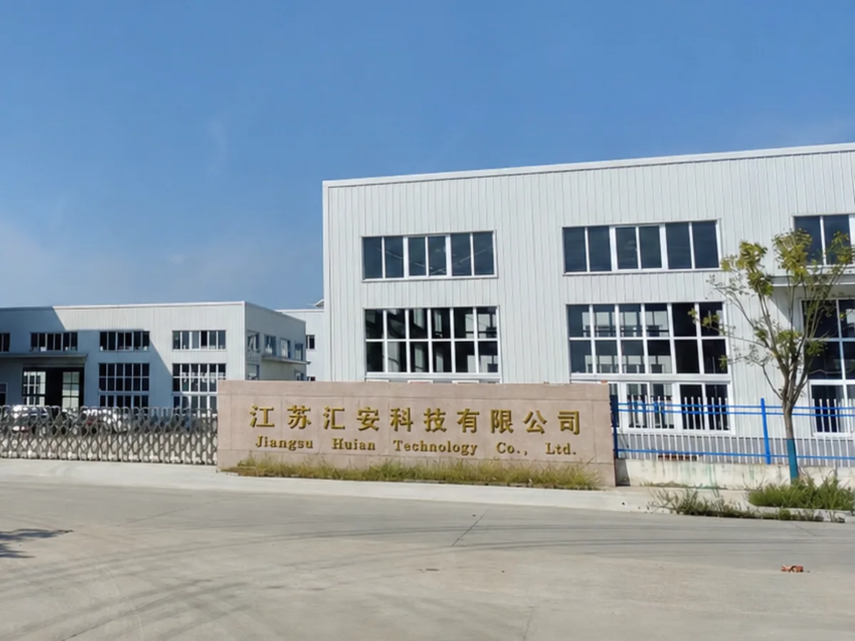 Jiangsu Huian Technology company nameplate at the factory entrance
