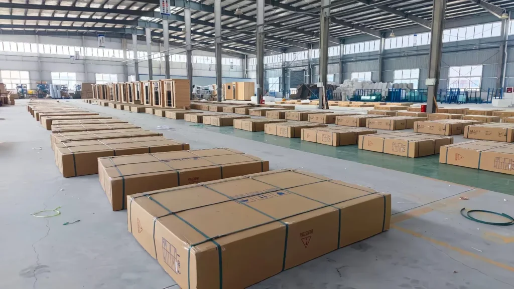Packed and strapped sauna kit cartons arranged in the Huian Sauna warehouse, illustrating packaging and shipment planning in the sauna RFQ checklist